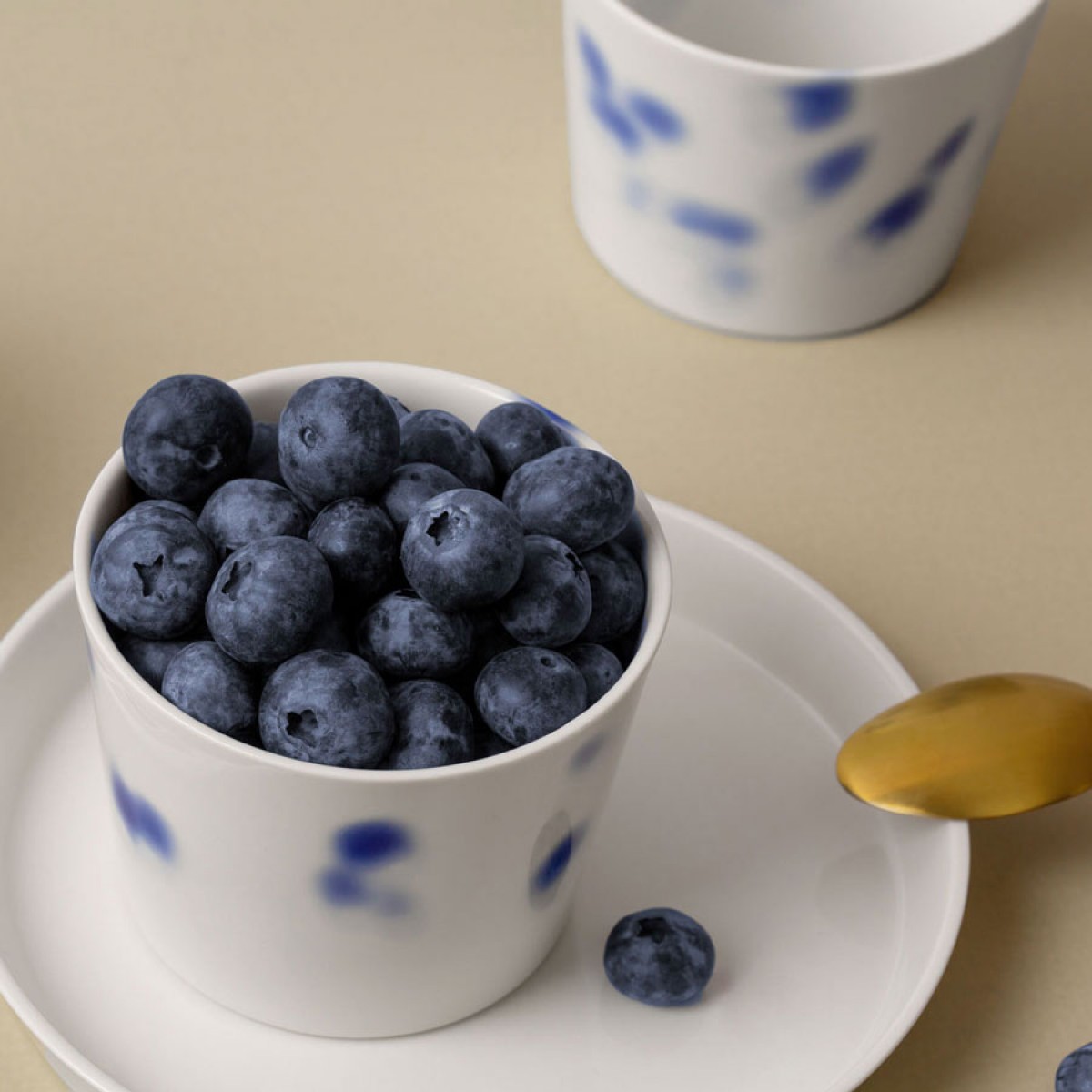 Porzellanbecher blaue Tupfen 200ml