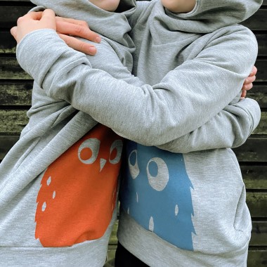 Wunschbrunnen | Kuschelhoodie kids "(E)ule" | Grau meliert/Rost
